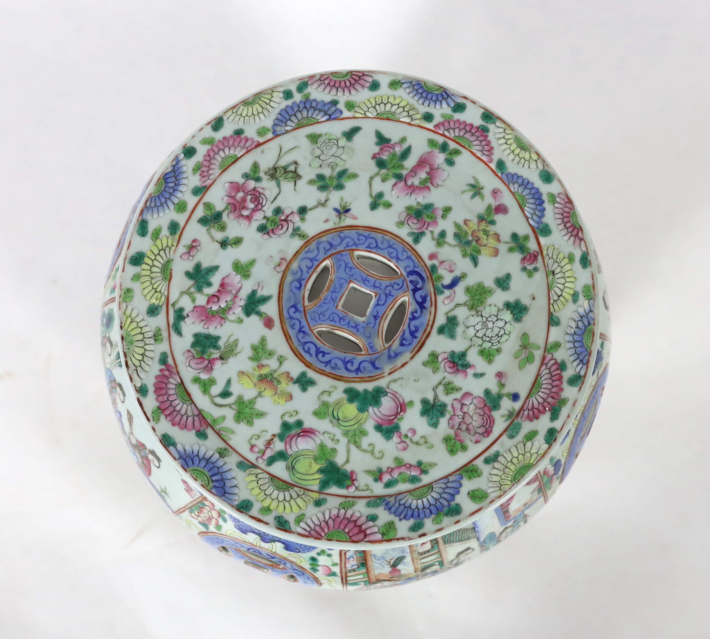 A Chinese Canton decorated famille rose garden seat, 19th century, broken and restored